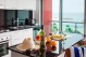 Enjoy The Spectacular View Of The Beach While Relaxing With a Glass Of Wine In Your Hotel