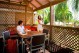 Soak up the tropical vibe on your private balcony