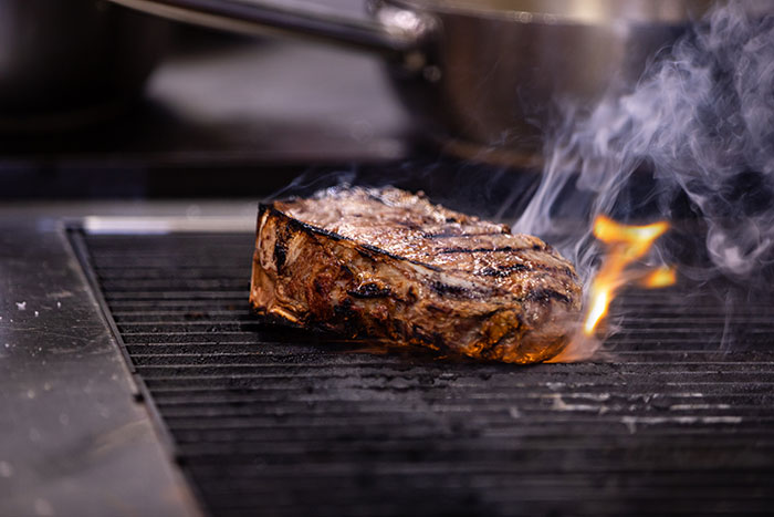 Steak on a flame grill